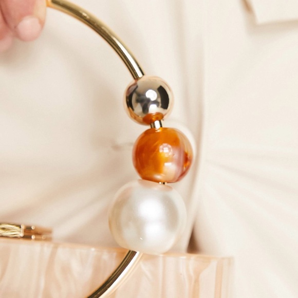 Resin clutch bag with metal beaded handle - Picture 2 of 9